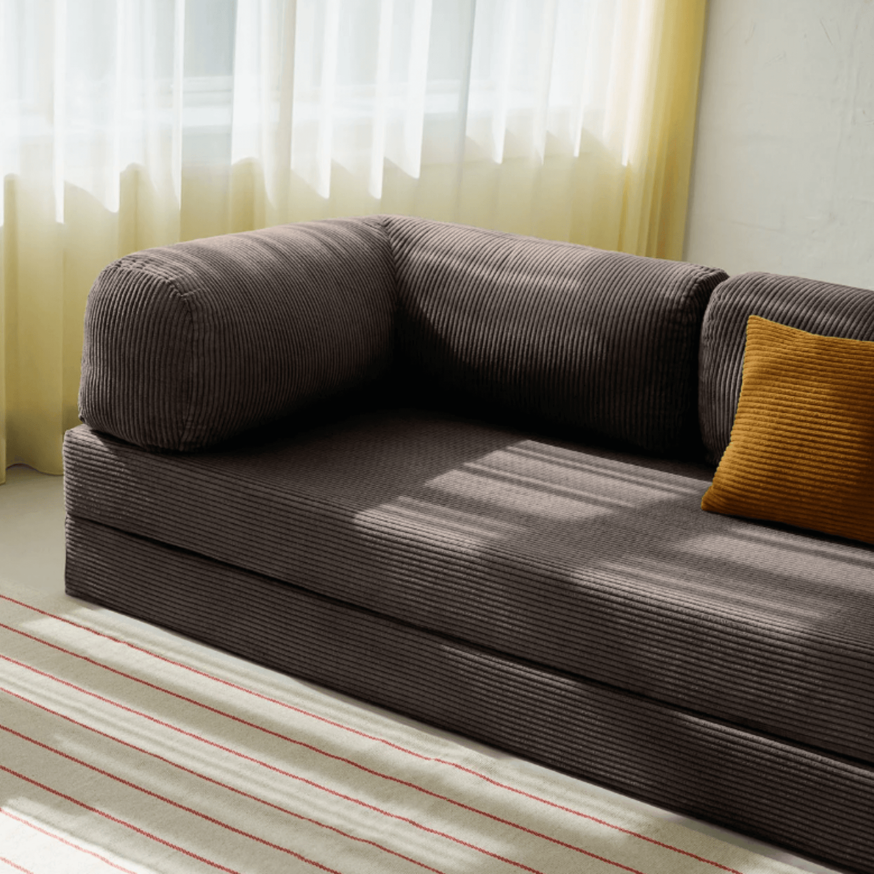 Primyhome brown corduroy convertible sleeper sofa detail and sofa armrest close-up