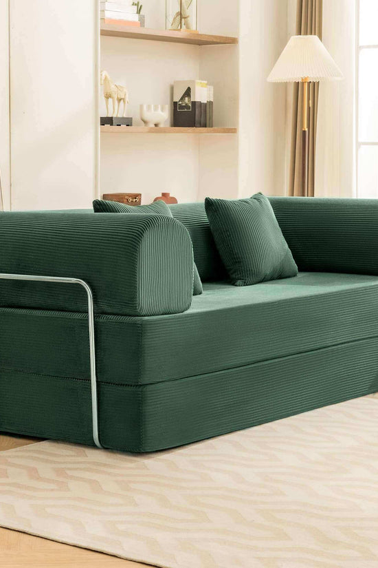 Primyhome Green mid-size foldable sofa bed with corduroy fabric and silver metal frame in a living room